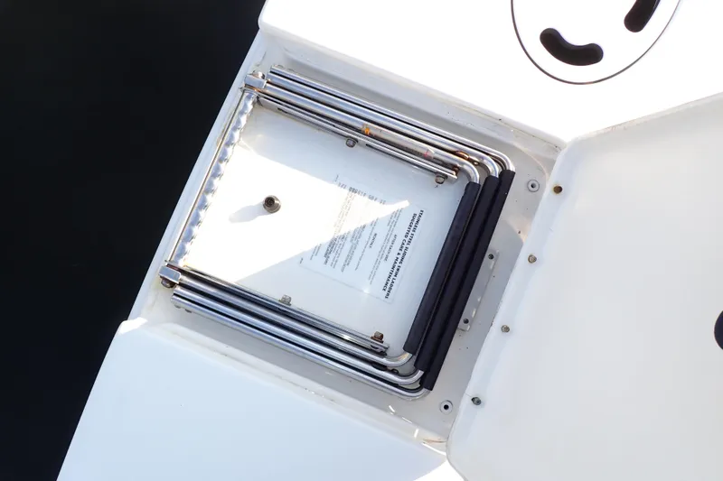 Lattitude Adjustment Yacht Photos Pics 2003 Sea Ray 480 Sedan Bridge boat ladder compartment, open view.