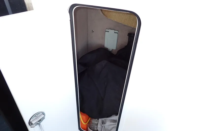 Lattitude Adjustment Yacht Photos Pics Storage compartment on a 2003 Sea Ray 480 Sedan Bridge boat.