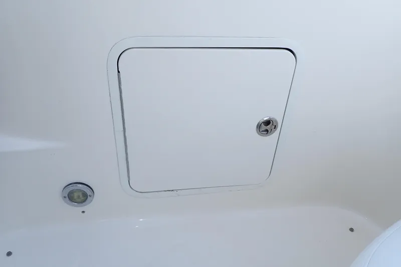 Lattitude Adjustment Yacht Photos Pics Access panel on 2003 Sea Ray 480 Sedan Bridge boat interior.