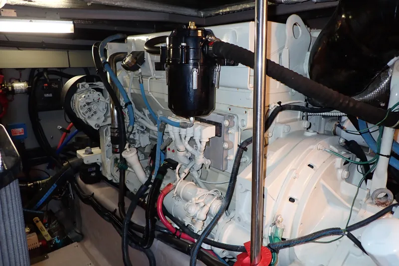 Lattitude Adjustment Yacht Photos Pics Engine room of 2003 Sea Ray 480 Sedan Bridge with visible mechanical components.