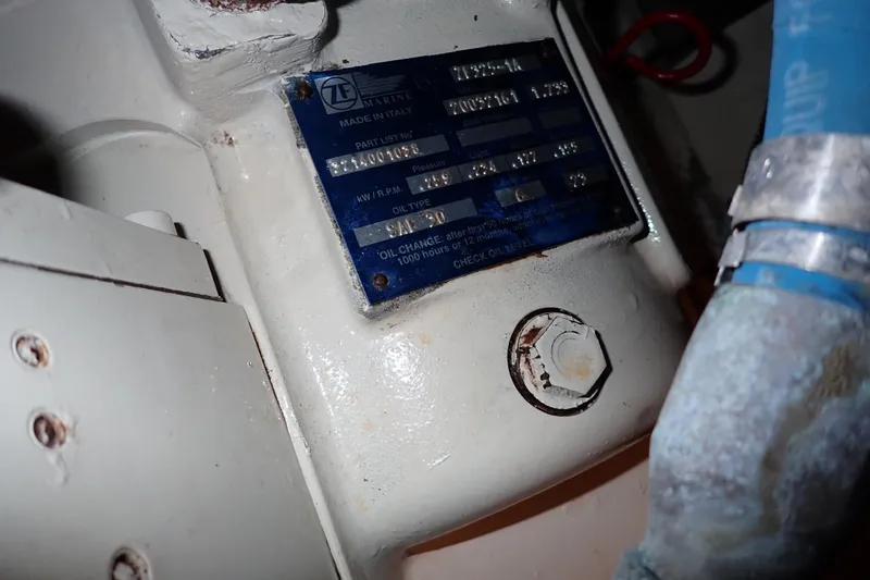 Lattitude Adjustment Yacht Photos Pics Close-up of a 2003 Sea Ray 480 Sedan Bridge engine component with a ZF Marine label.