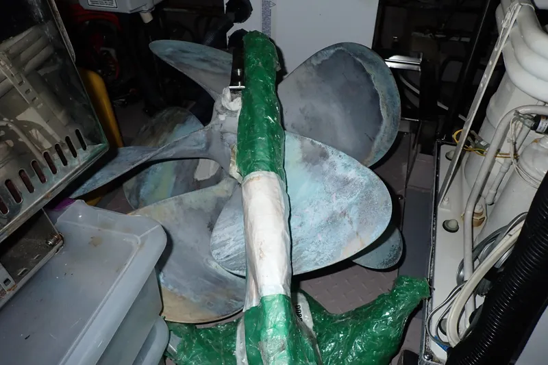 Lattitude Adjustment Yacht Photos Pics Propeller of a 2003 Sea Ray 480 Sedan Bridge, wrapped for protection.