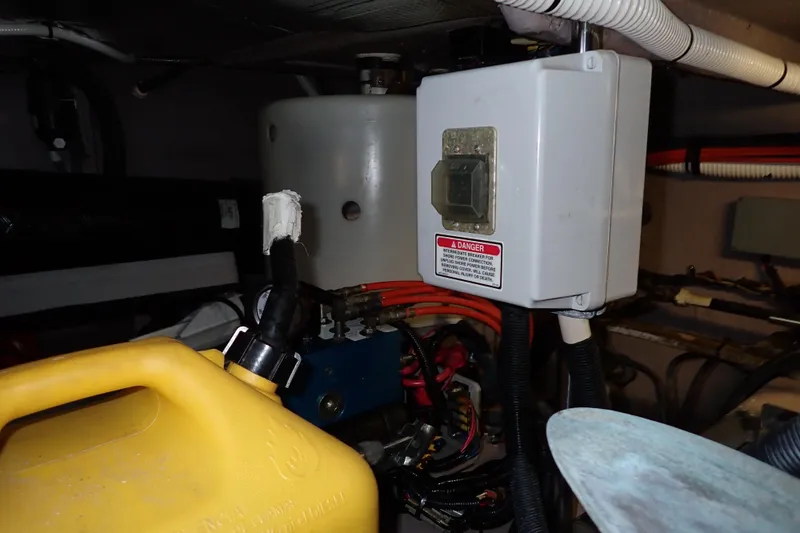 Lattitude Adjustment Yacht Photos Pics Engine room of 2003 Sea Ray 480 Sedan Bridge with electrical components and wiring.