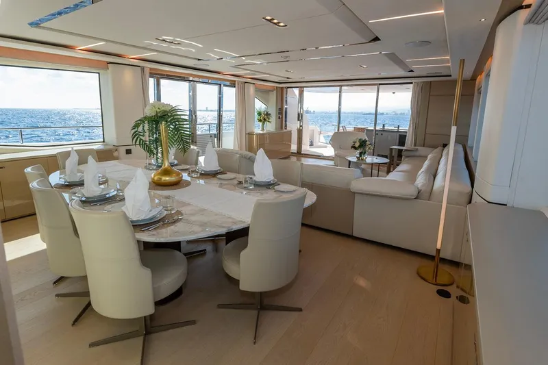 Nadira Yacht Photos Pics Luxurious interior of 2019 Princess 30M yacht with elegant dining and seating areas.