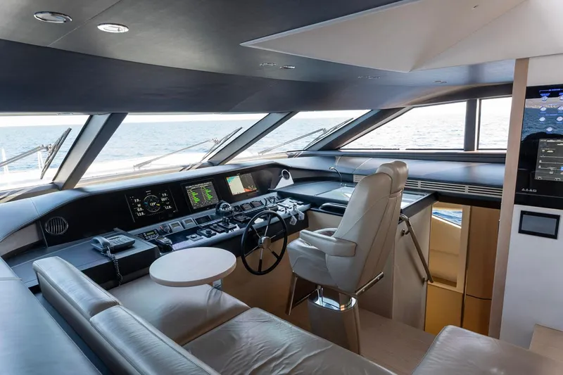 Nadira Yacht Photos Pics Luxurious 2019 Princess 30M yacht cockpit with modern navigation equipment and ocean view.