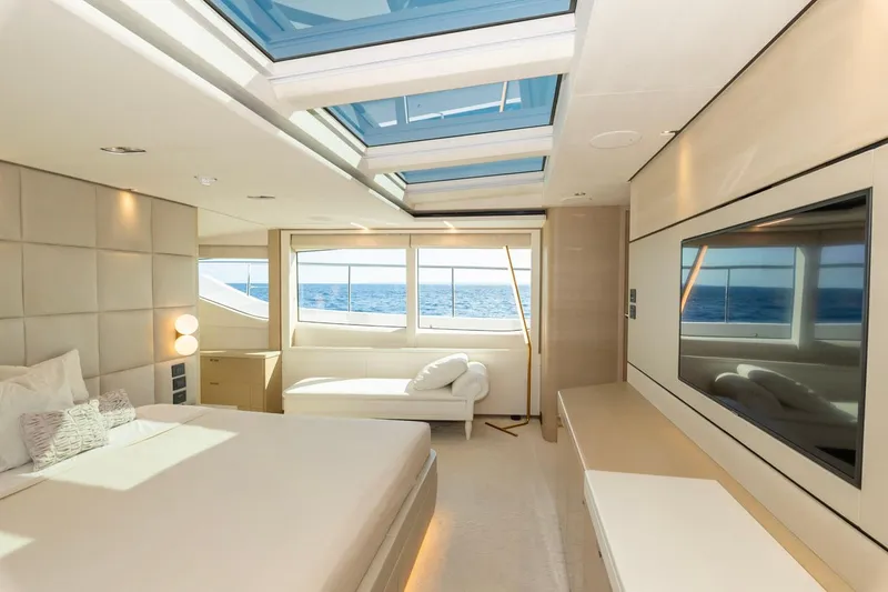 Nadira Yacht Photos Pics Luxurious 2019 Princess 30M yacht bedroom with ocean view and modern interior design.