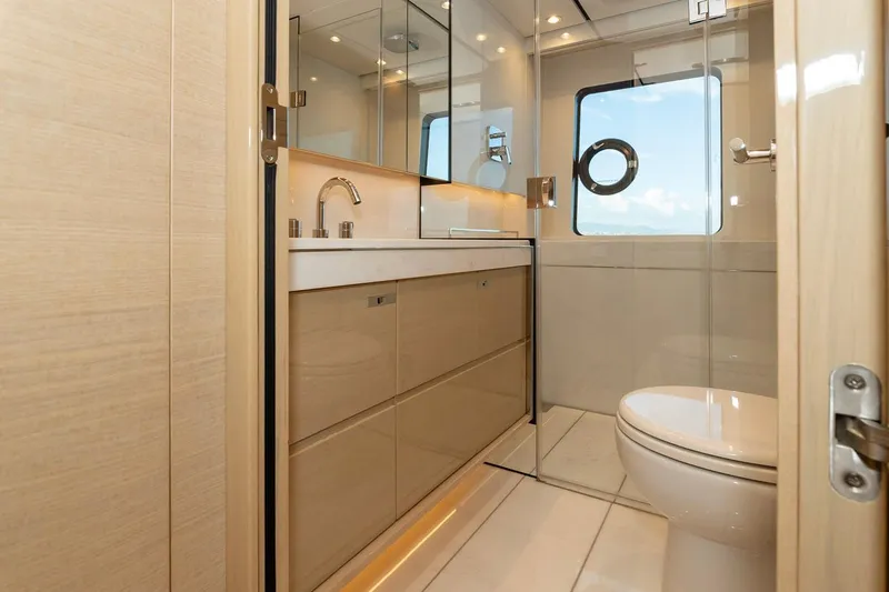 Nadira Yacht Photos Pics Luxurious bathroom on 2019 Princess 30M yacht with modern fixtures and ocean view.