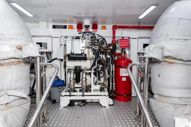 Nadira Yacht Photos Pics Engine room of 2019 Princess 30M yacht with machinery and safety equipment.