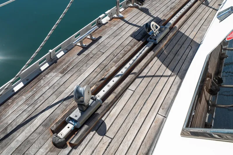 Majestic Yacht Photos Pics Tayana 58 Deck Saloon 2006 yacht deck with wooden finish and sail track system.