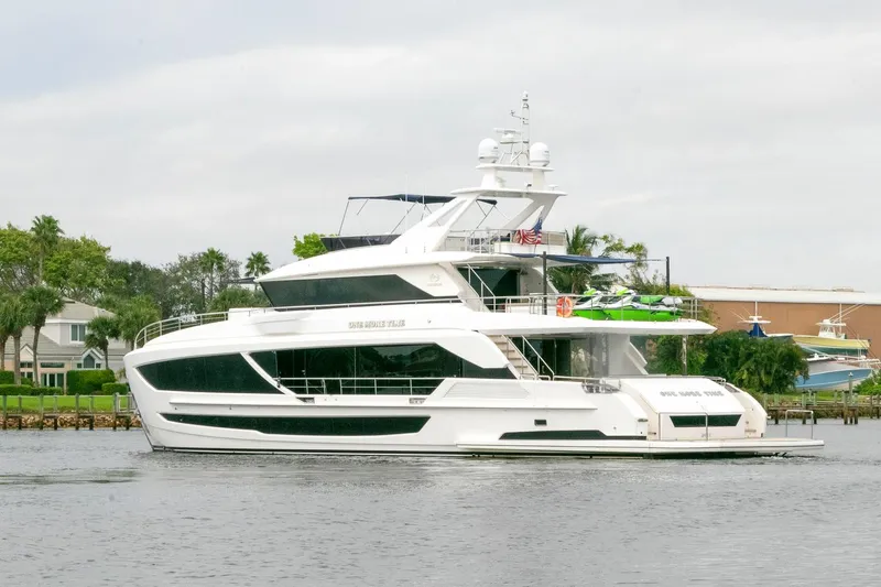 One More Time Yacht Photos Pics Luxury Horizon FD92 yacht cruising on a calm river, 2021 model.