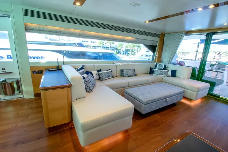 One More Time Yacht Photos Pics Luxurious yacht interior with spacious seating, modern design, and large windows. Horizon FD92, 2021 model.
