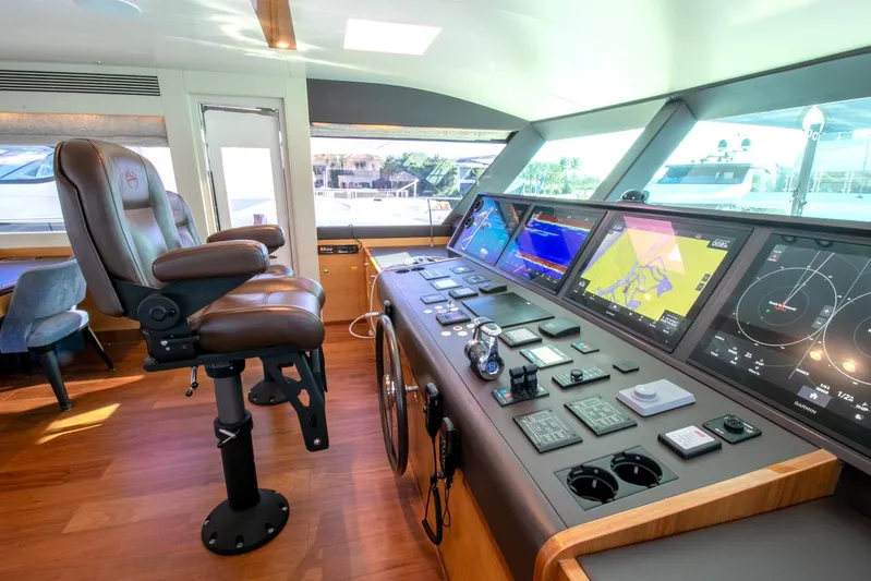 One More Time Yacht Photos Pics Luxurious Horizon FD92 yacht helm with advanced navigation systems, 2021 model.