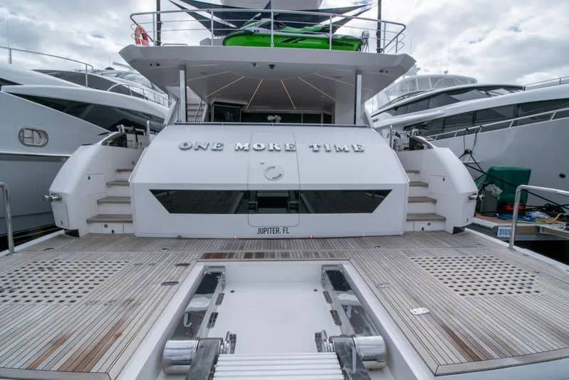 One More Time Yacht Photos Pics Luxury yacht Horizon FD92, 2021 model, docked with "One More Time" on the stern.
