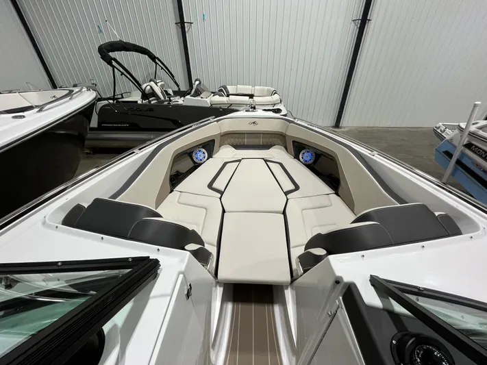  Yacht Photos Pics 2023 Monterey 298 Super Sport boat interior with sleek seating and modern design.