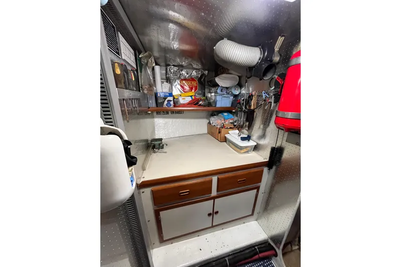 Abina Yacht Photos Pics Utility area on a 2001 Kadey-Krogen 39 boat with storage and tools.