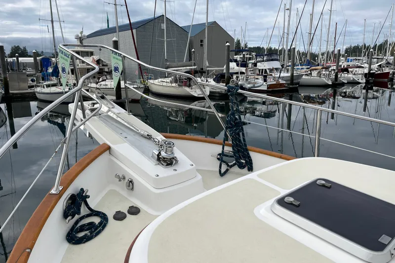 Abina Yacht Photos Pics Kadey-Krogen 39 yacht, 2001 model, docked in a marina with sailboats.