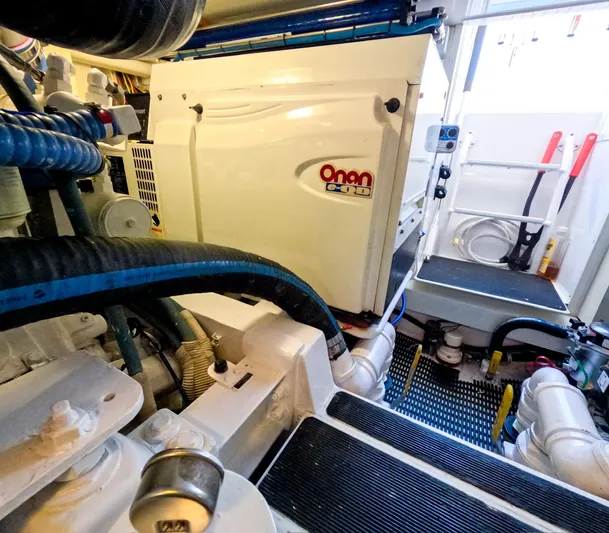 Farmers Daughter Yacht Photos Pics Engine room of 2004 Viking 45 Convertible with Onan generator.