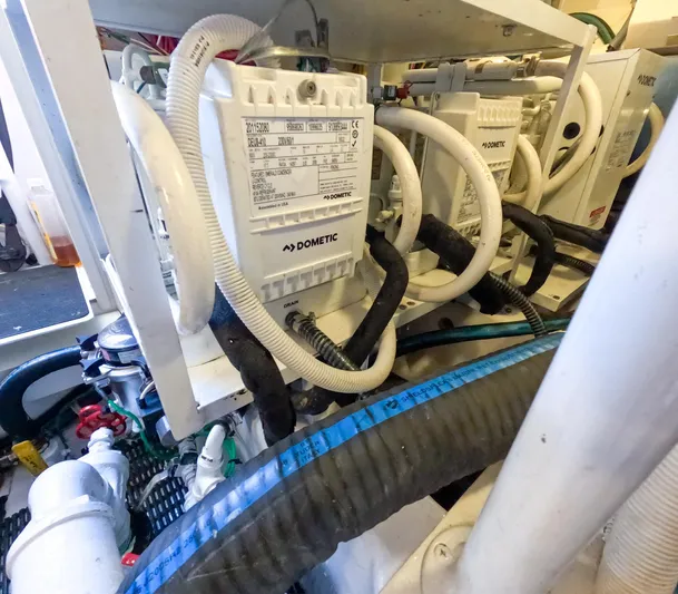 Farmers Daughter Yacht Photos Pics Engine room of 2004 Viking 45 Convertible with Dometic equipment and wiring.