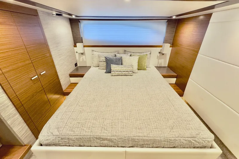  Yacht Photos Pics Luxurious bedroom interior of 2020 Tiara Yachts F53 Flybridge with modern design.