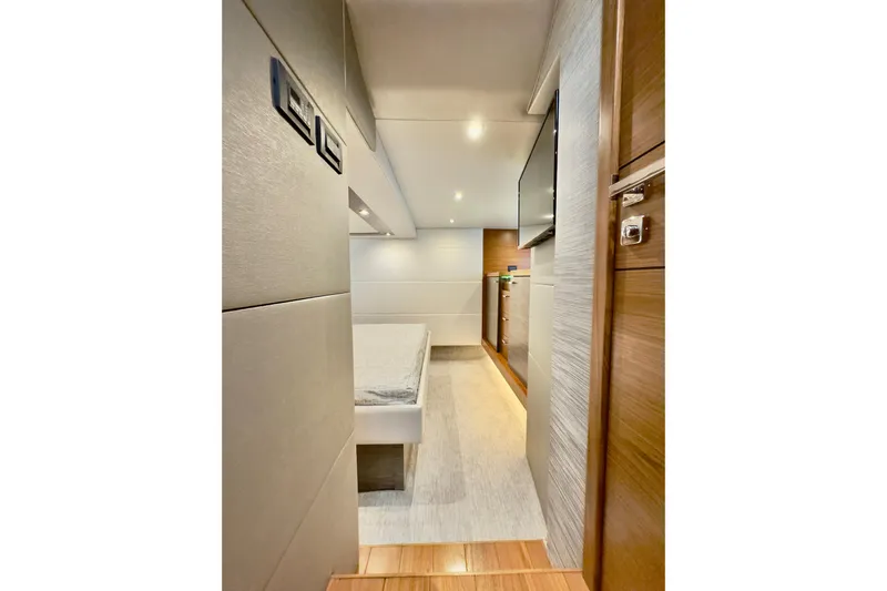  Yacht Photos Pics 2020 Tiara Yachts F53 Flybridge interior cabin with modern design and wood accents.