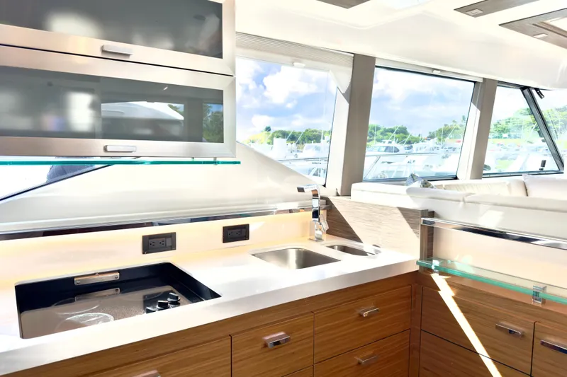  Yacht Photos Pics Luxurious kitchen interior of 2020 Tiara Yachts F53 Flybridge with modern amenities.