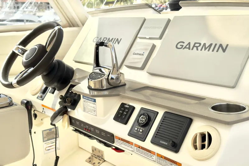  Yacht Photos Pics Helm of 2020 Tiara Yachts F53 Flybridge with Garmin navigation system.