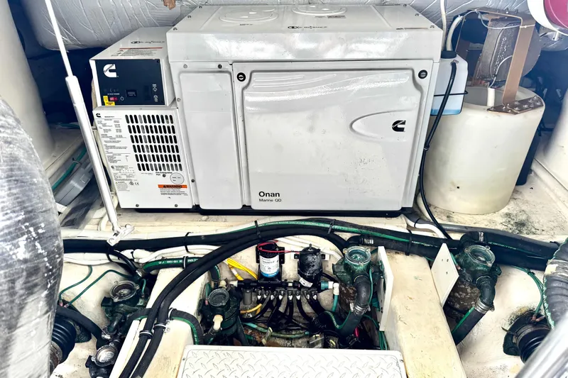  Yacht Photos Pics Engine room of 2020 Tiara Yachts F53 Flybridge with Onan Marine generator.