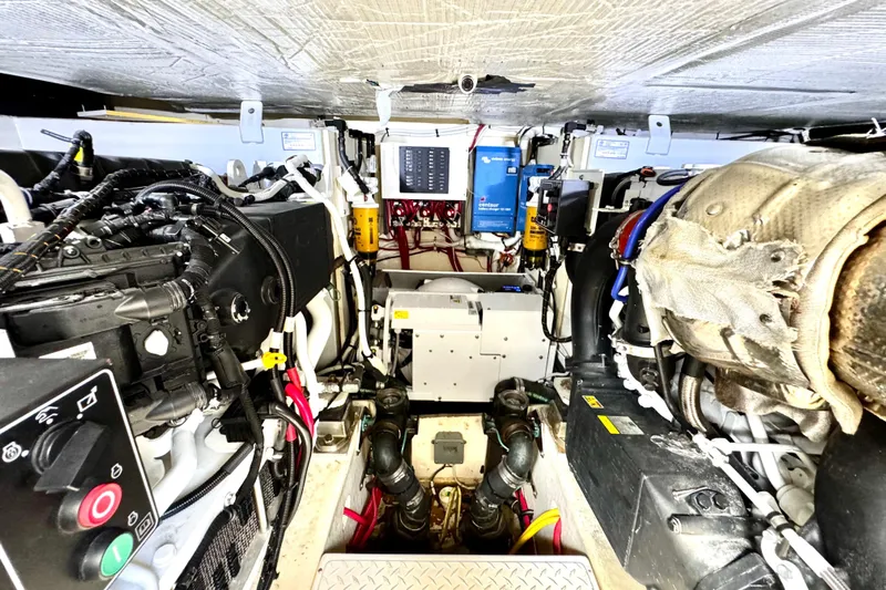 Yacht Photos Pics Engine room of 2020 Tiara Yachts F53 Flybridge, showcasing mechanical components and systems.