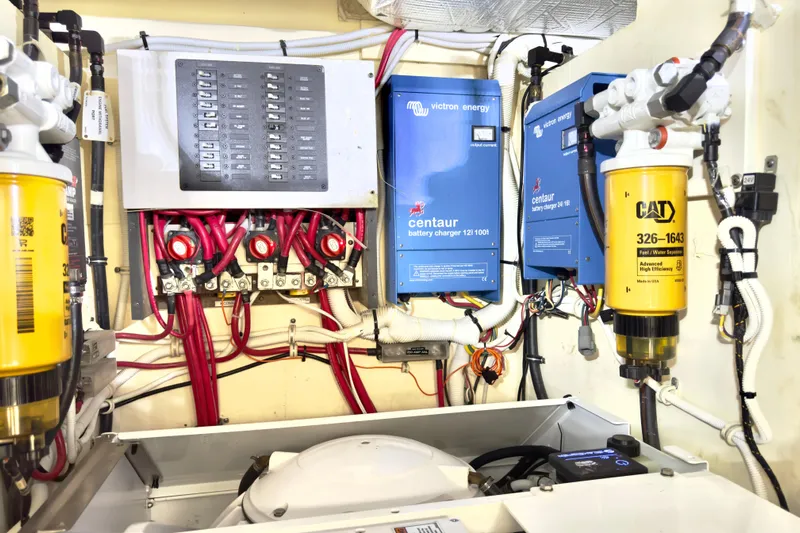  Yacht Photos Pics Electrical system of 2020 Tiara Yachts F53 Flybridge with battery chargers and wiring.