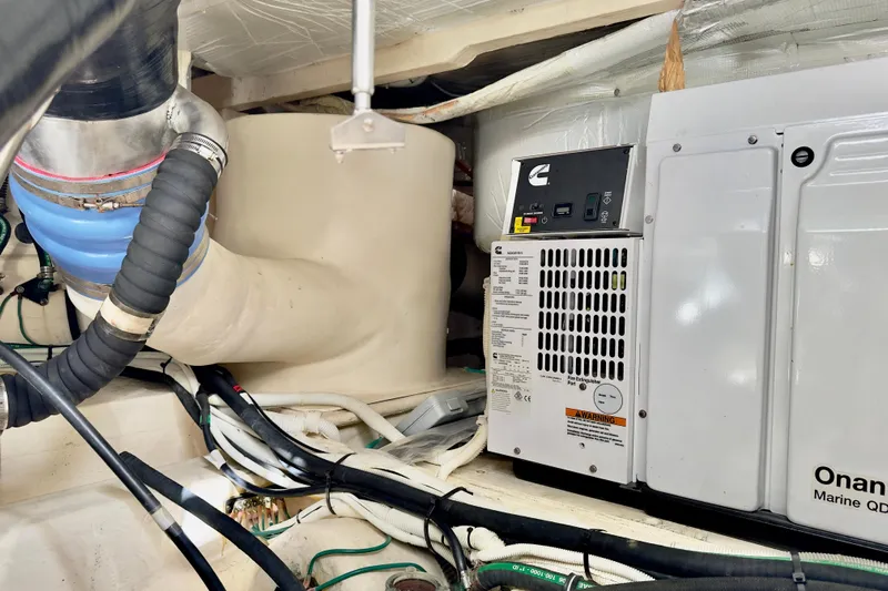  Yacht Photos Pics Engine room of 2020 Tiara Yachts F53 Flybridge with Onan Marine generator.