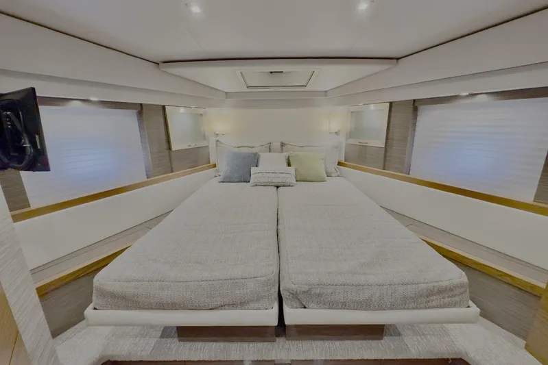  Yacht Photos Pics Luxurious bedroom interior of 2020 Tiara Yachts F53 Flybridge with modern design.