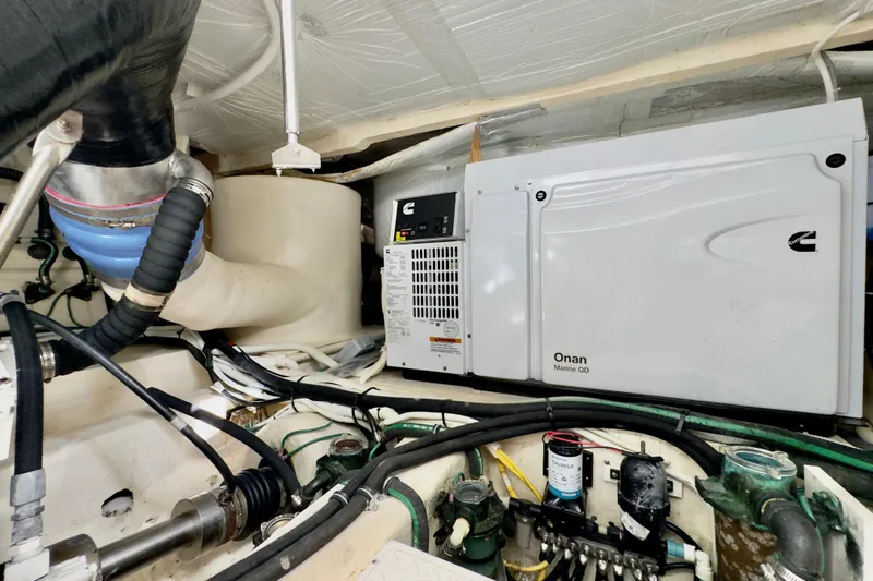  Yacht Photos Pics Engine room of 2020 Tiara Yachts F53 Flybridge with Onan Marine generator.