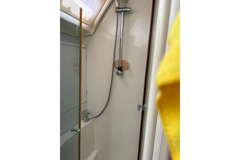  Yacht Photos Pics Shower area in a 2008 Beneteau 49 yacht, featuring a sleek design and modern fixtures.