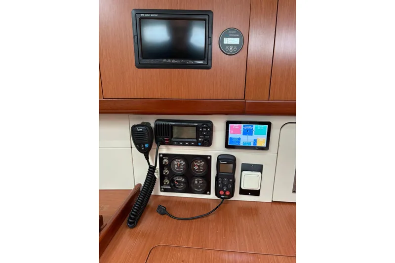  Yacht Photos Pics Control panel of a 2008 Beneteau 49 yacht with navigation and communication equipment.