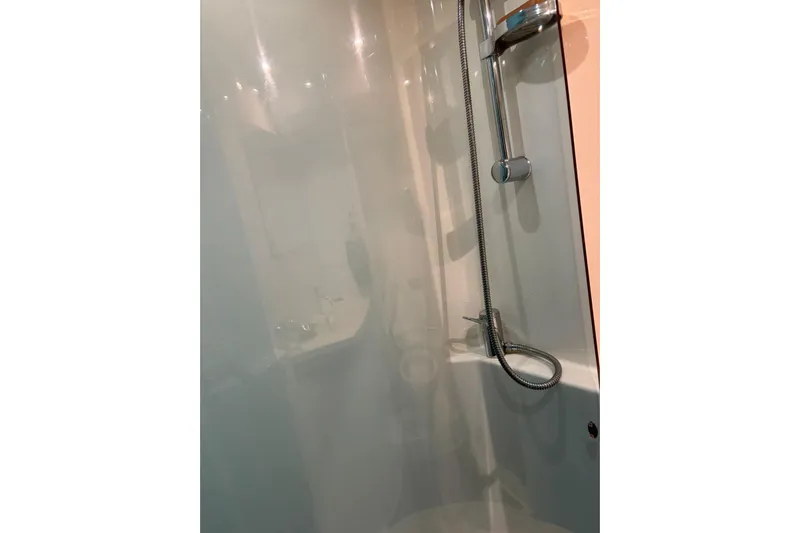  Yacht Photos Pics Shower area in 2008 Beneteau 49 yacht, featuring modern fixtures and sleek design.