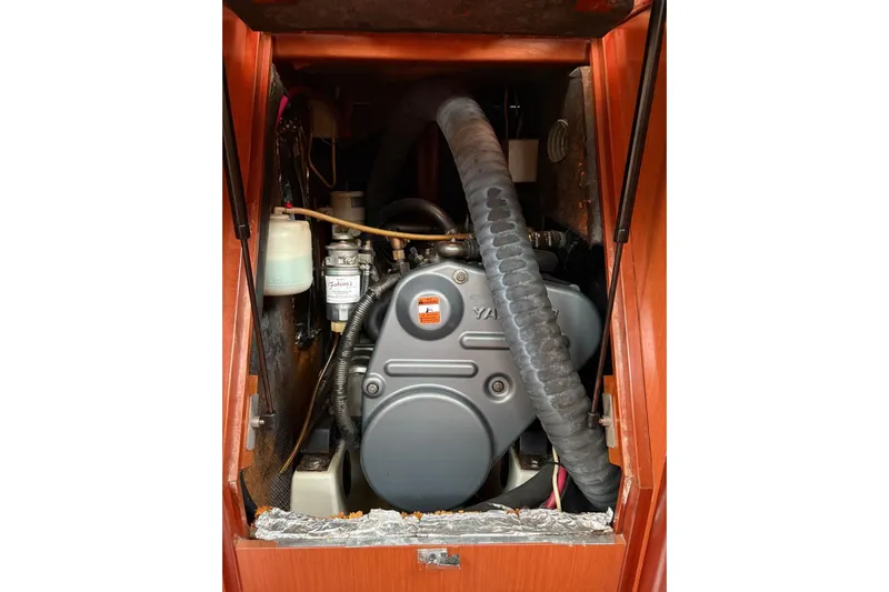  Yacht Photos Pics Engine compartment of a 2008 Beneteau 49 sailboat, featuring a Yanmar engine.