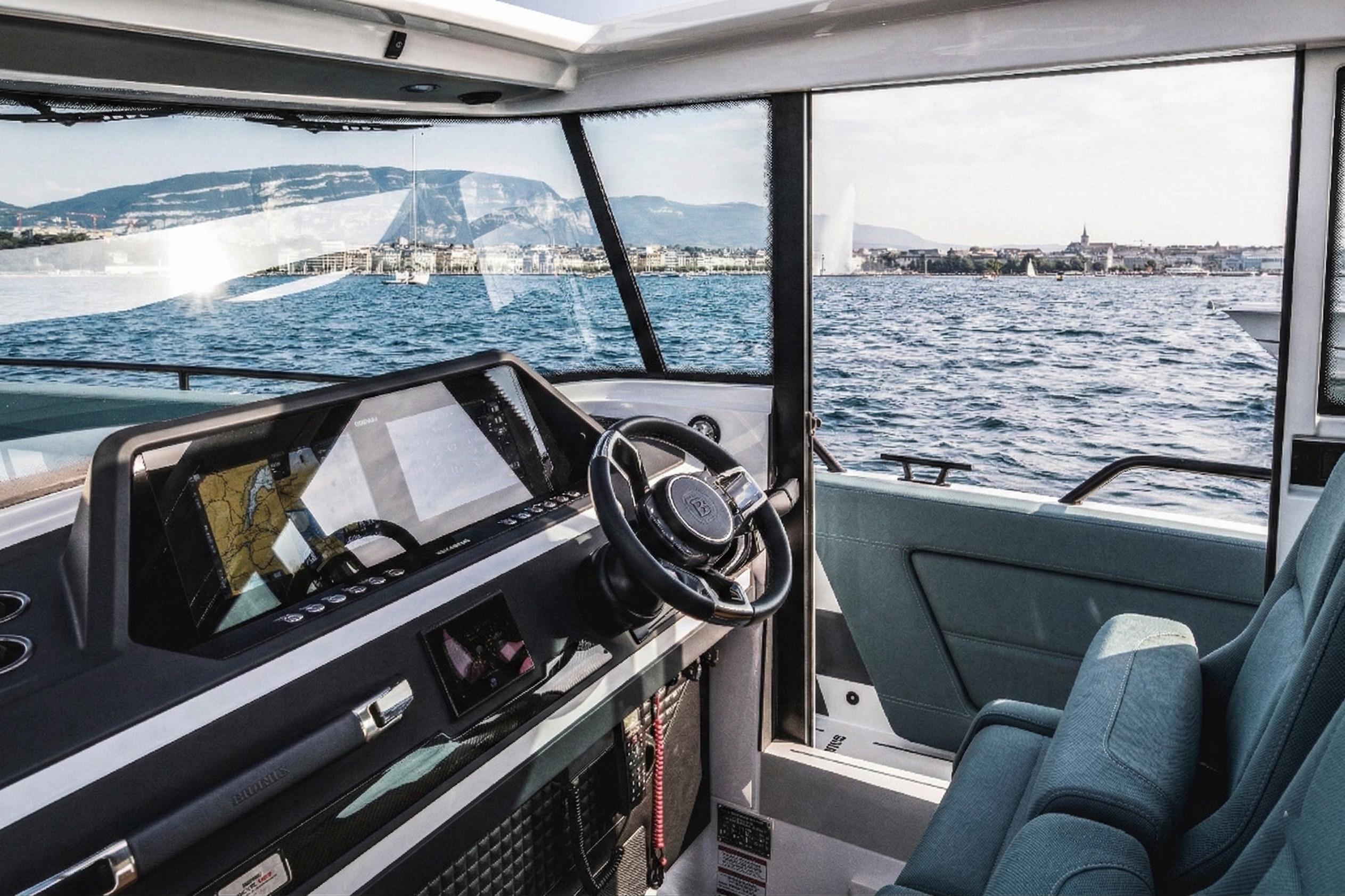 2024 BRABUS Shadow 500 Cabin Wet Bar interior with scenic ocean view.