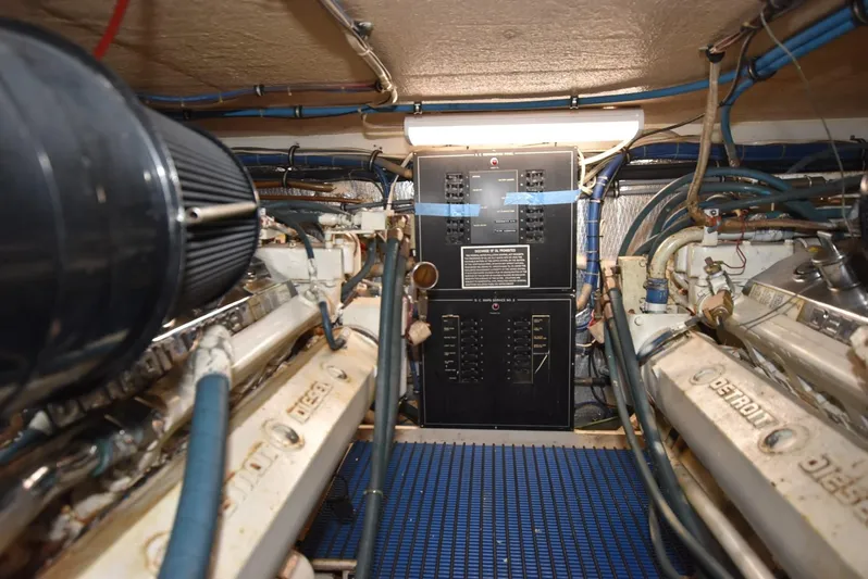 Crazy Train Yacht Photos Pics Engine room of 1996 Hatteras 50 Convertible yacht with Detroit Diesel engines.