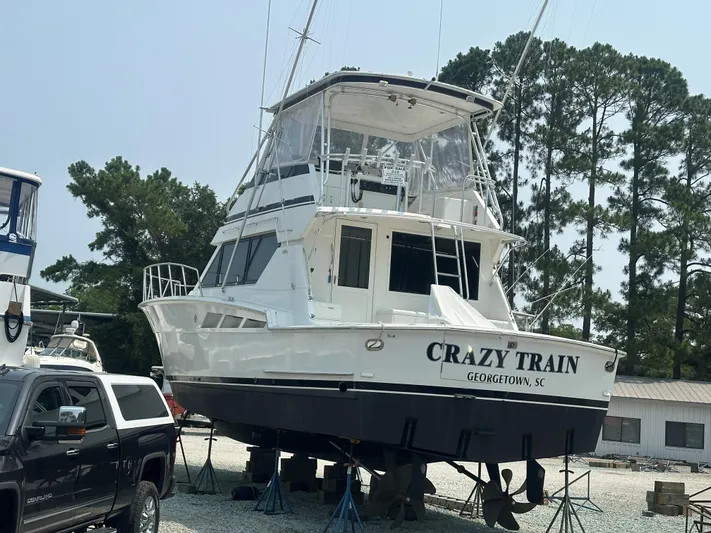 Crazy Train Yacht Photos Pics 1996 Hatteras 50 Convertible yacht named "Crazy Train" on stands, Georgetown, SC.