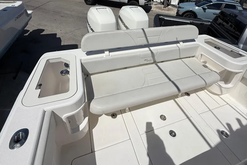  Yacht Photos Pics 2022 SeaVee 322z boat interior with seating and storage compartments.