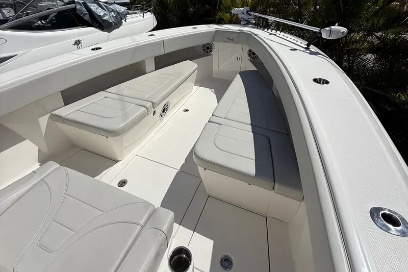  Yacht Photos Pics 2022 SeaVee 322z boat interior with cushioned seating and sleek design.
