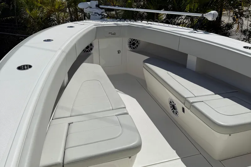  Yacht Photos Pics 2022 SeaVee 322z boat interior with cushioned seating and modern design.
