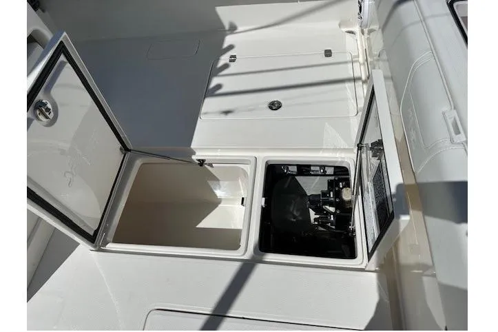 Reel Craft Yacht Photos Pics 2024 SeaVee 340Z boat deck with open storage compartments.