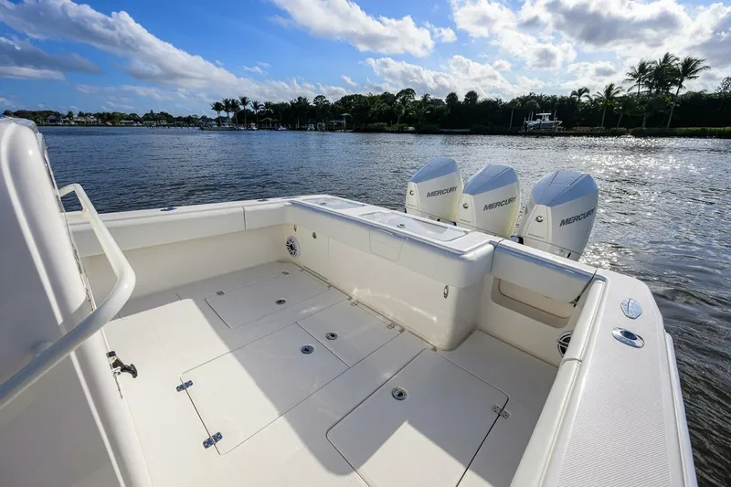Reel Craft Yacht Photos Pics 2024 SeaVee 340Z boat with triple Mercury engines on a sunny day.