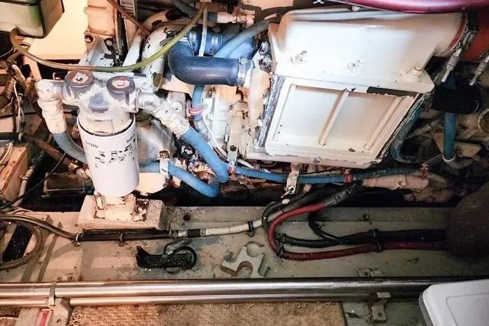  Yacht Photos Pics Engine room of 1988 Hatteras 43 Motor Yacht with visible components and wiring.