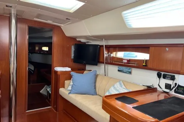 Comfort Zone Yacht Photos Pics Interior of 2007 Beneteau 49 yacht with cozy seating and modern amenities.