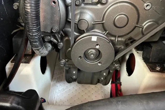 Comfort Zone Yacht Photos Pics Engine compartment of a 2007 Beneteau 49 sailboat, showcasing mechanical components.