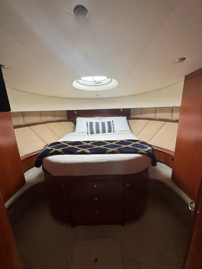  Yacht Photos Pics Luxurious bedroom interior of 2009 Silverton 45 Convertible yacht with elegant bedding.