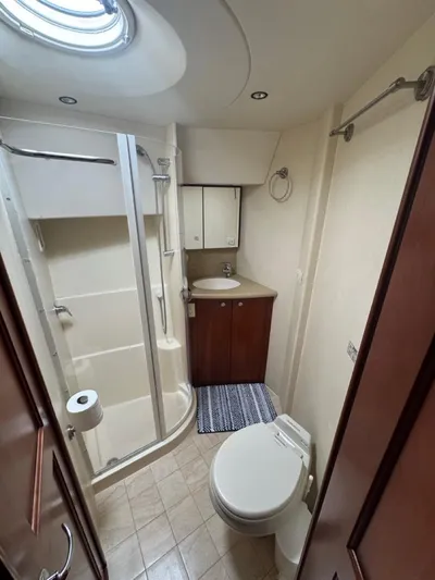  Yacht Photos Pics Luxurious bathroom in 2009 Silverton 45 Convertible yacht with shower and toilet.