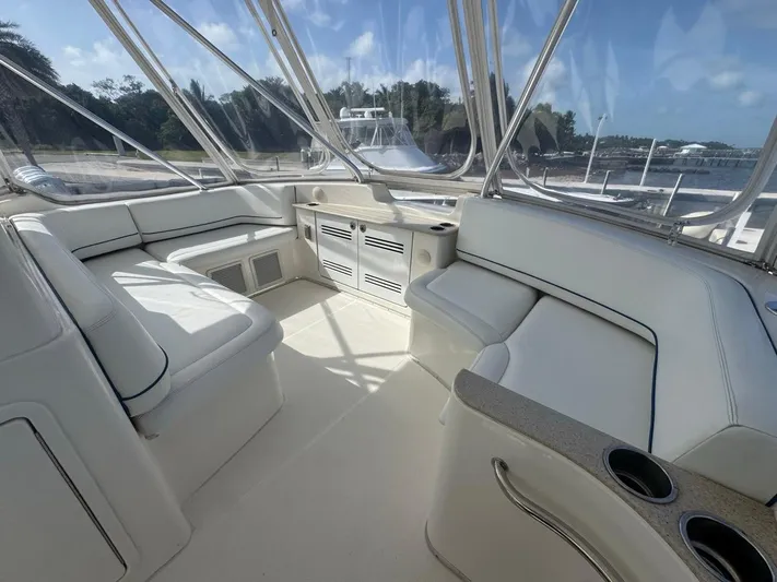  Yacht Photos Pics 2009 Silverton 45 Convertible yacht interior with white seating and panoramic windows.